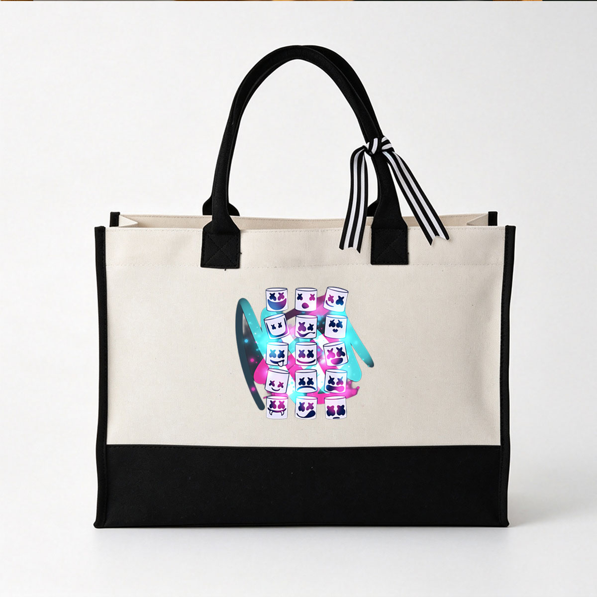 Marshmello: 12 Emoji Faces with Expressive Smiles and X-Eyes on a Glowing Background - Canvas patchwork gift tote bag