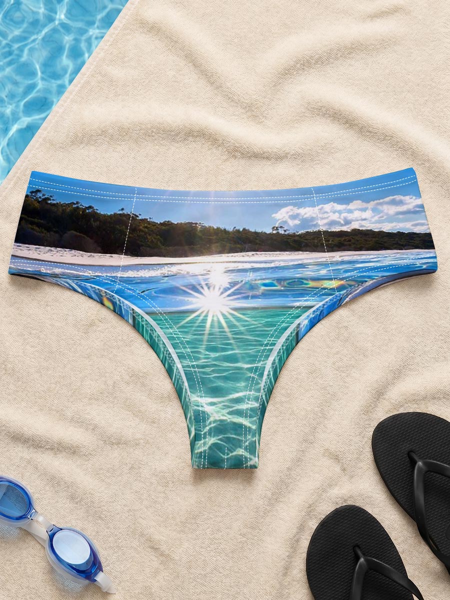 Sunshine Sparkles on Crystal Clear Waters -  Men's swim trunks