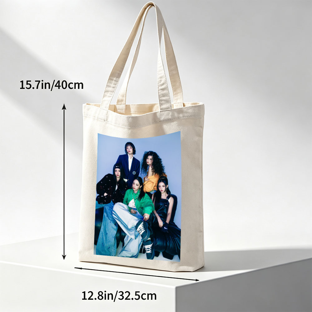 NewJeans Group Photo - Five Members in Stylish Outfits Posed Against a Blue Background - Canvas tote bags