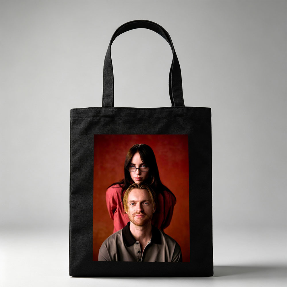 The Postal Service - Portrait of Ben Gibbard and Jenny Lewis Against a Warm Red Background - Canvas tote bags