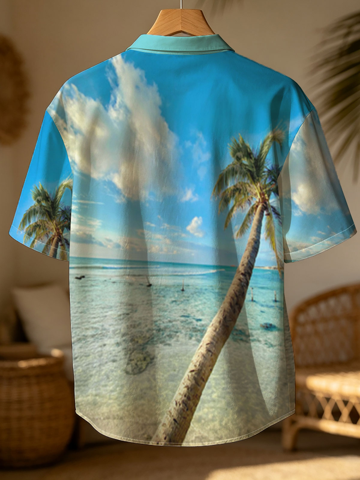 Tropical beach with palm tree leaning over clear blue water under a bright sky. -  Shirt