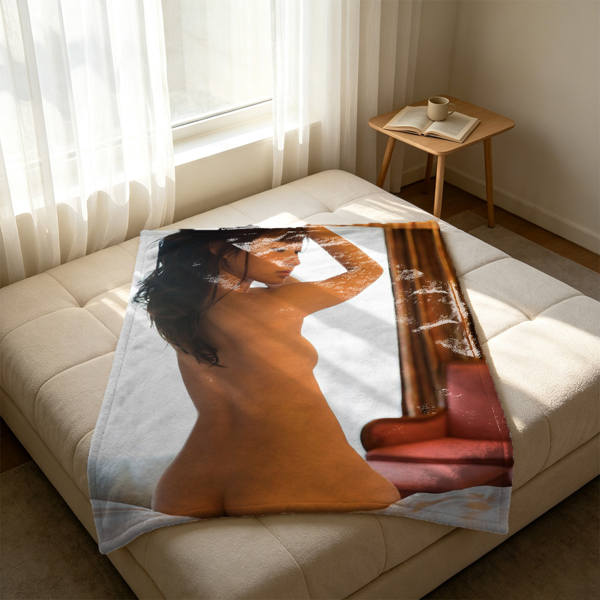 Emma Watson in white top lying on grey couch holding blue pen in mouth. - Blanket