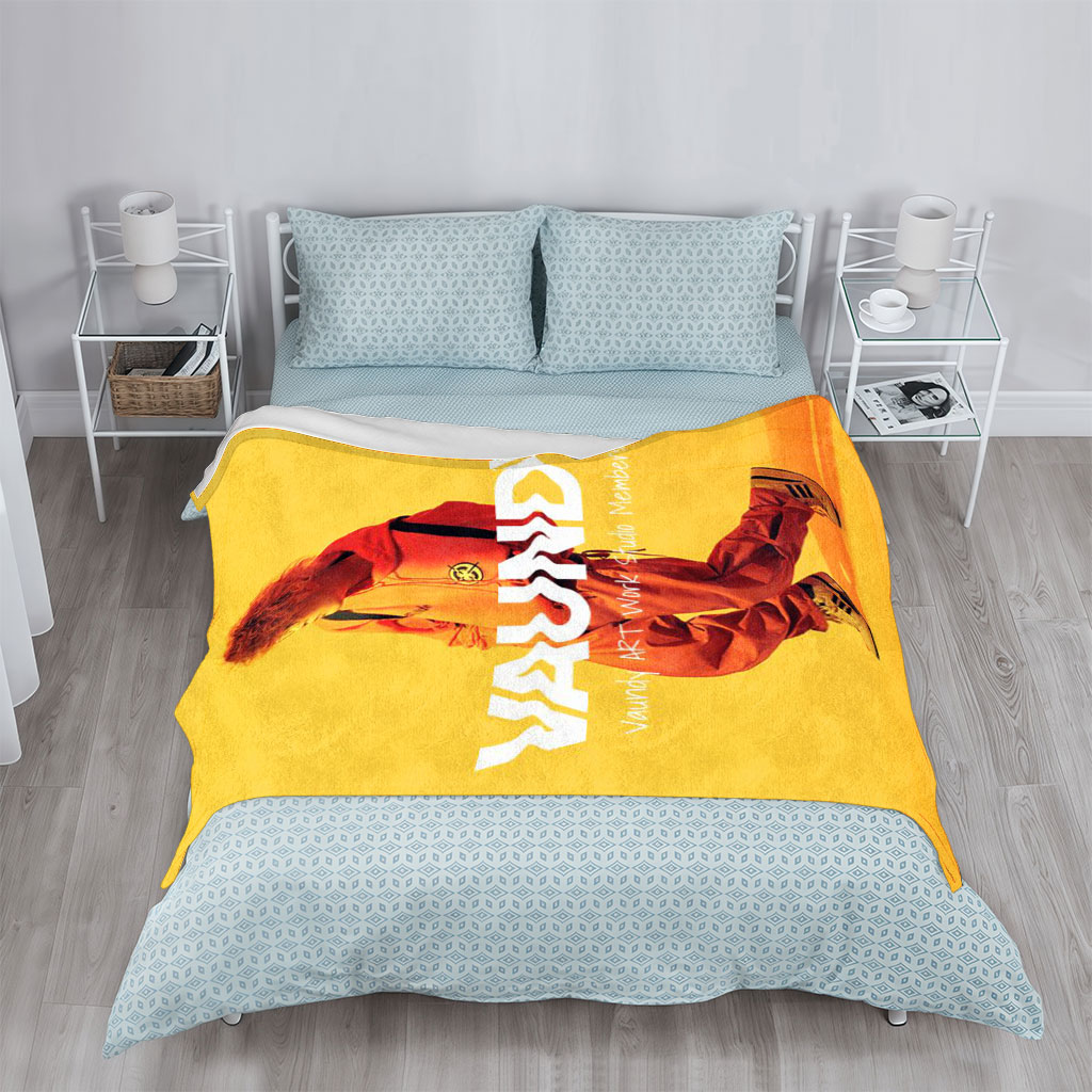 Vaundy in a Vibrant Yellow Studio Setting Wearing Orange Tracksuit and Sneakers - Blankets