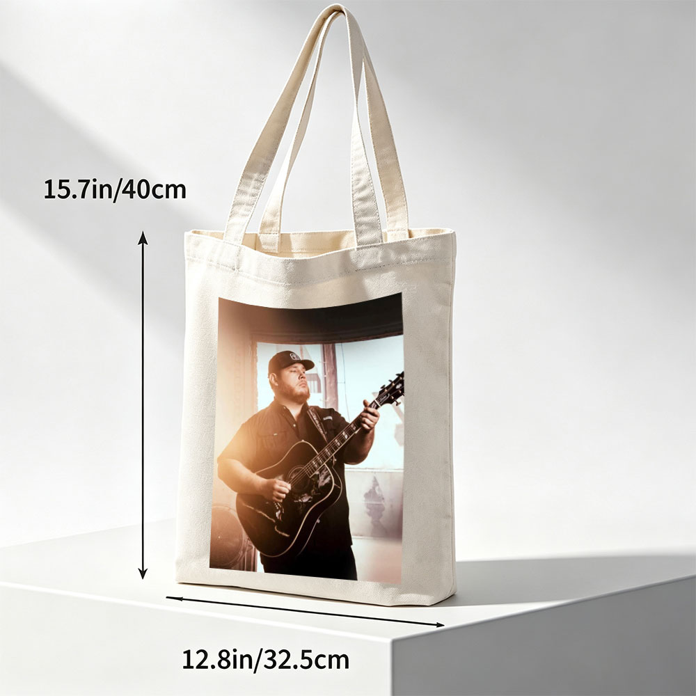 Luke Combs Playing Acoustic Guitar in a Sunlit Room - Canvas tote bags