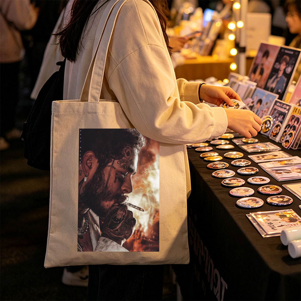 Post Malone Smoking Cigarette with Tattooed Face and Intense Background - Canvas tote bags