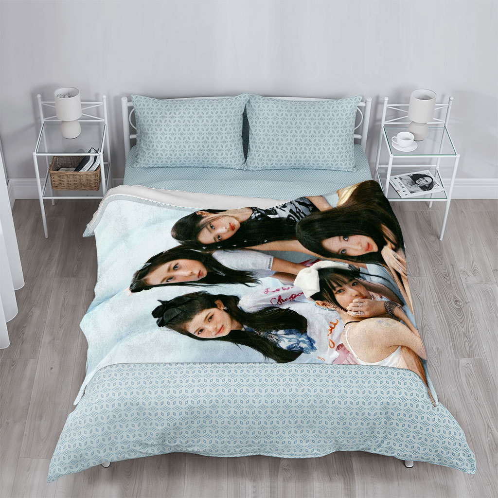 NewJeans Group Photo on Soft Blue Background with Casual Outfits and Relaxed Poses - Blankets