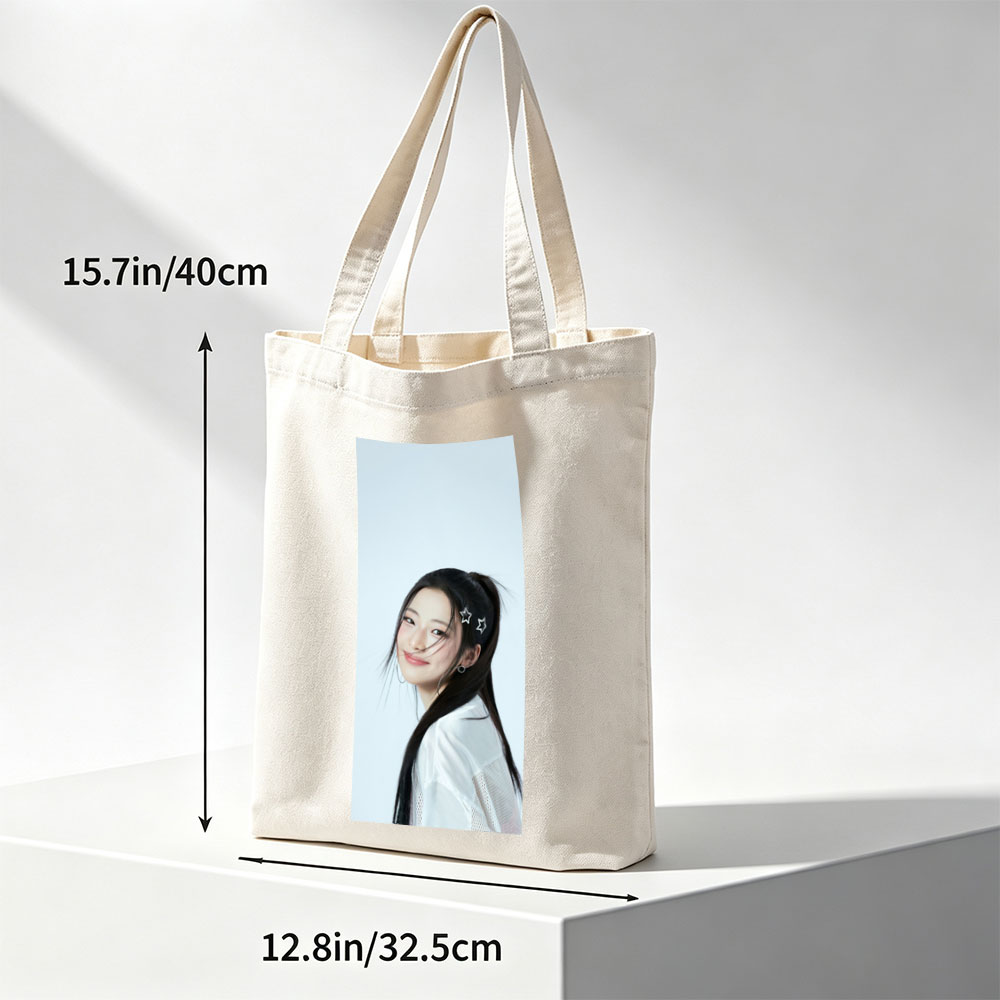 Korean Actress in White Outfit with Star Hair Clips Smiling Softly Against Light Blue Background - Canvas tote bags