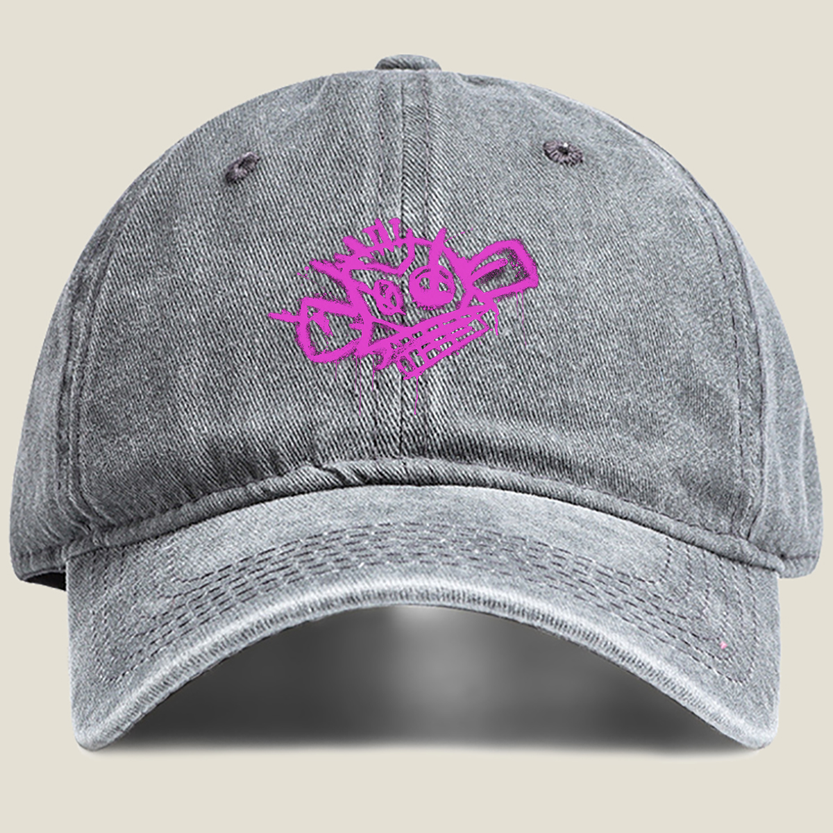 Graffiti-style pink skull with crown and crossbones on black background - Washed Denim - Baseball Cap