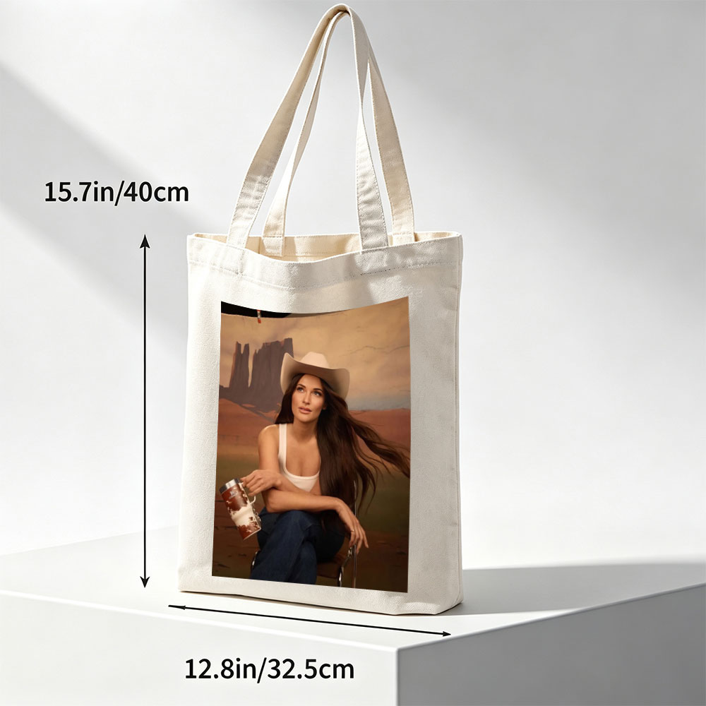 Jennifer Lopez in Cowboy Hat Holding a Mug Against Desert Backdrop - Canvas tote bags