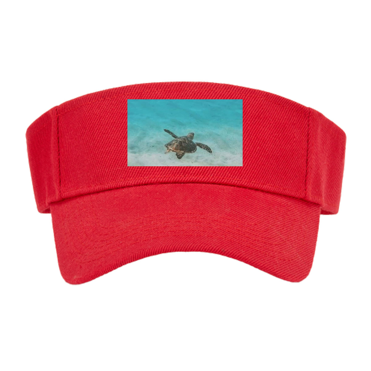 Sea turtle swimming in clear blue water over sandy ocean floor -  Visor cap