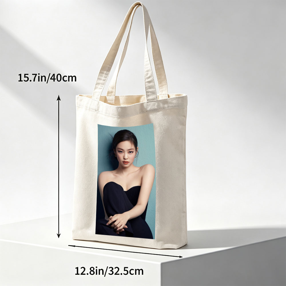Jennie Kim in Elegant Black Strapless Dress Against Teal Background - Canvas tote bags