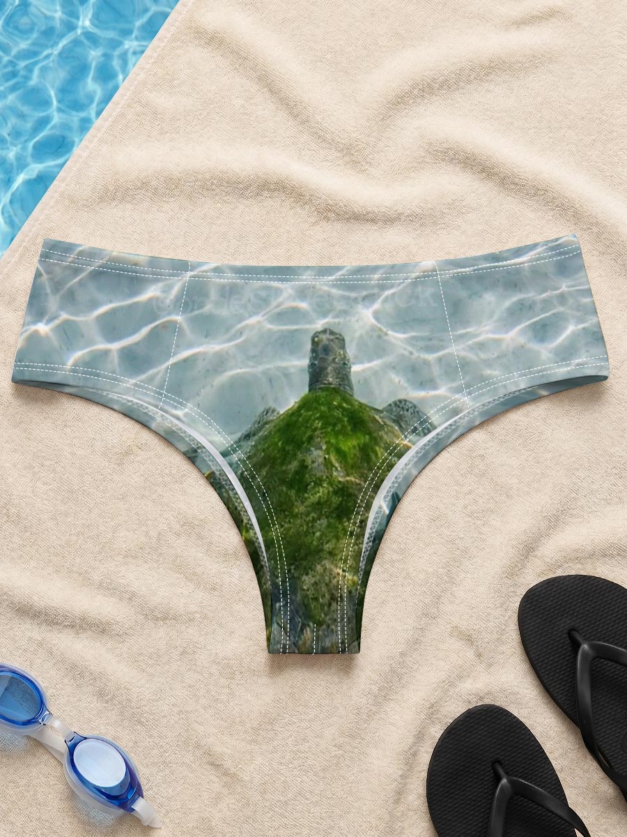 Sea turtle swimming in clear shallow water -  Men's swim trunks