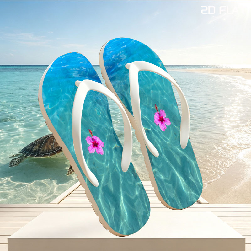 Pink hibiscus floating on crystal clear turquoise water -  flip-flops