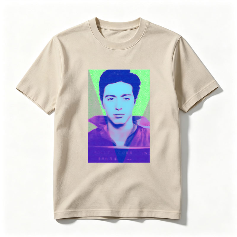 A stylized portrait of a man with vibrant, colorful lighting and geometric overlays. - Tee