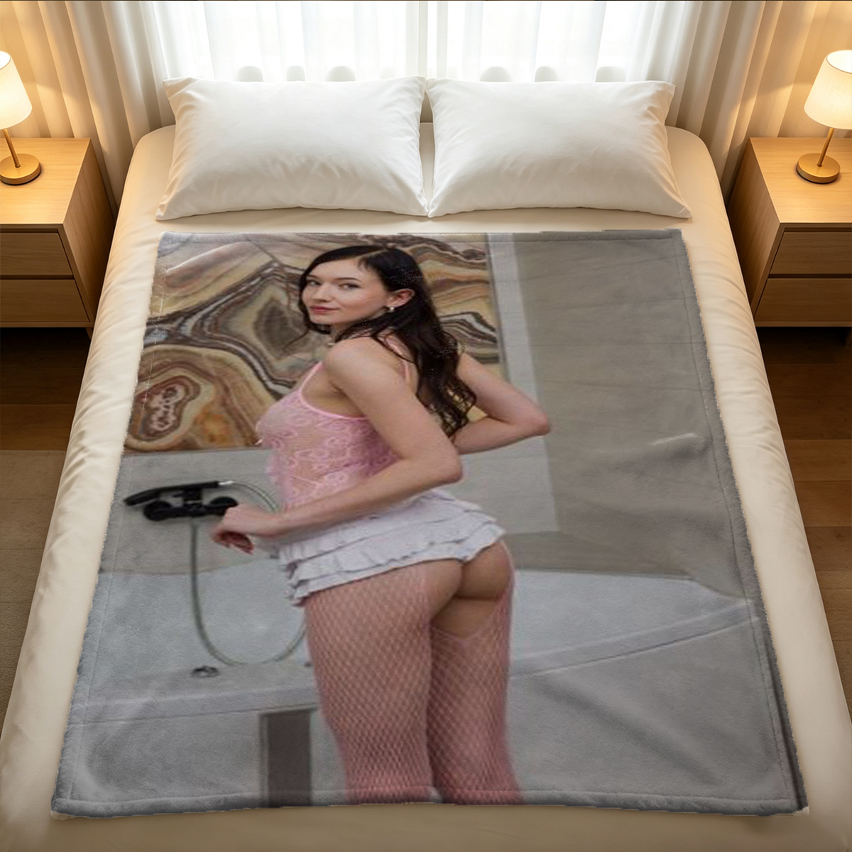 A woman teasing her naked ass with a black feather tickler on a bed. - Blanket