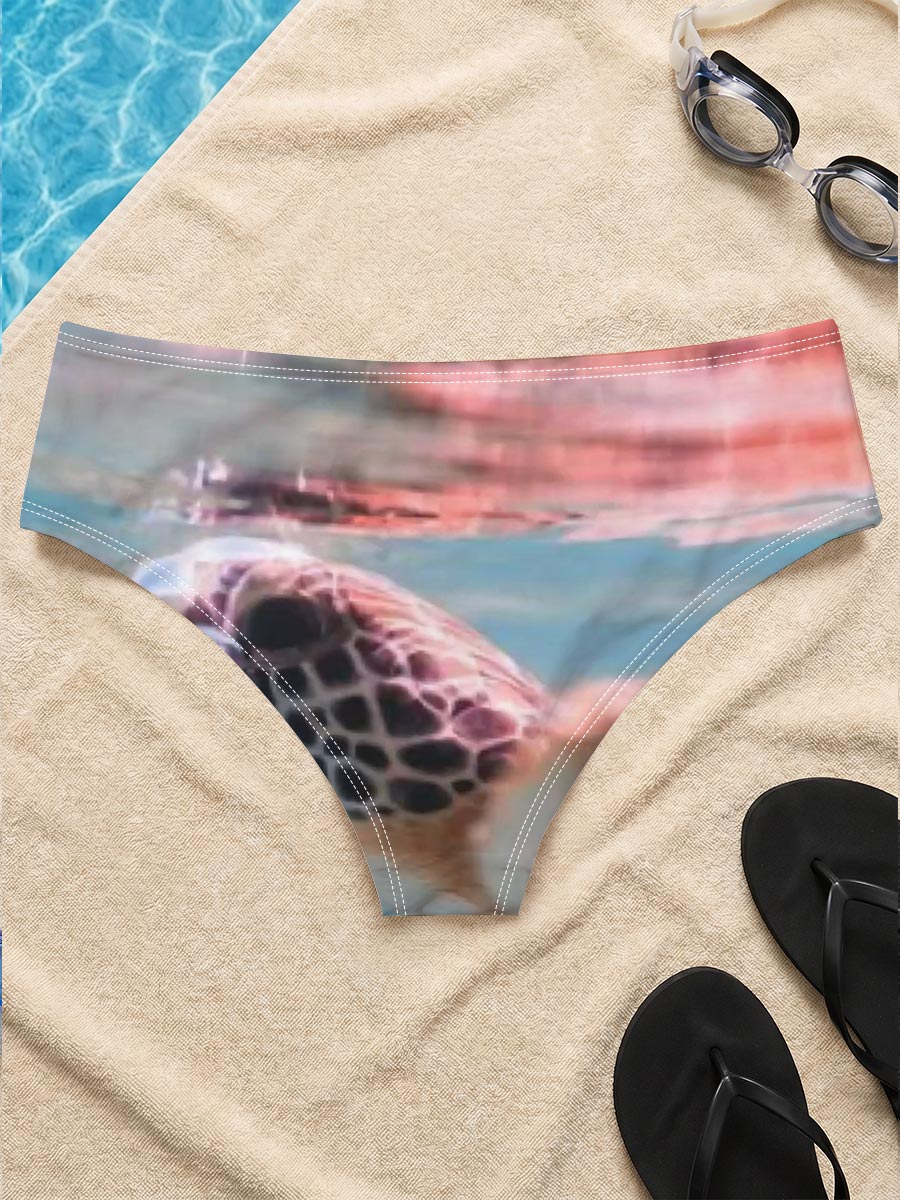 Sea turtle swimming at surface, half above water, clear blue ocean backdrop. -  Men's swim trunks