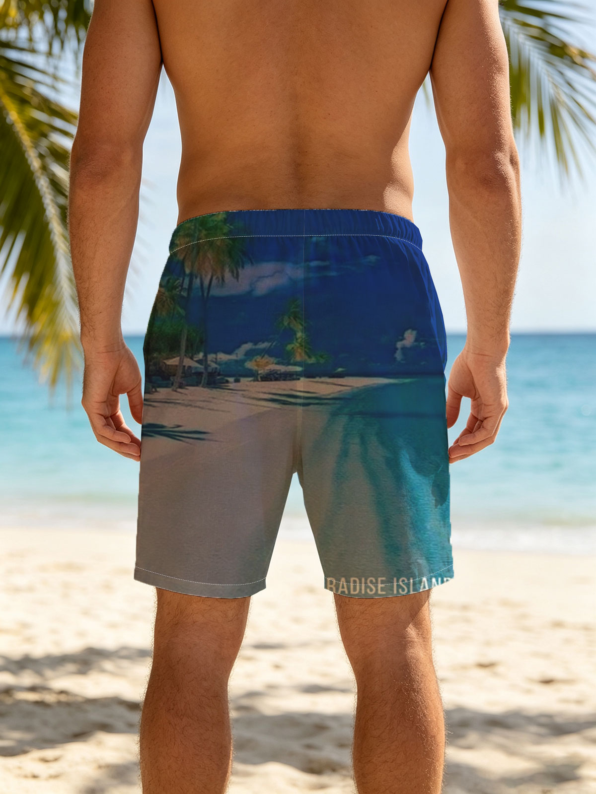 Serene beach with palm trees and turquoise waters under a clear blue sky. -  Beach shorts