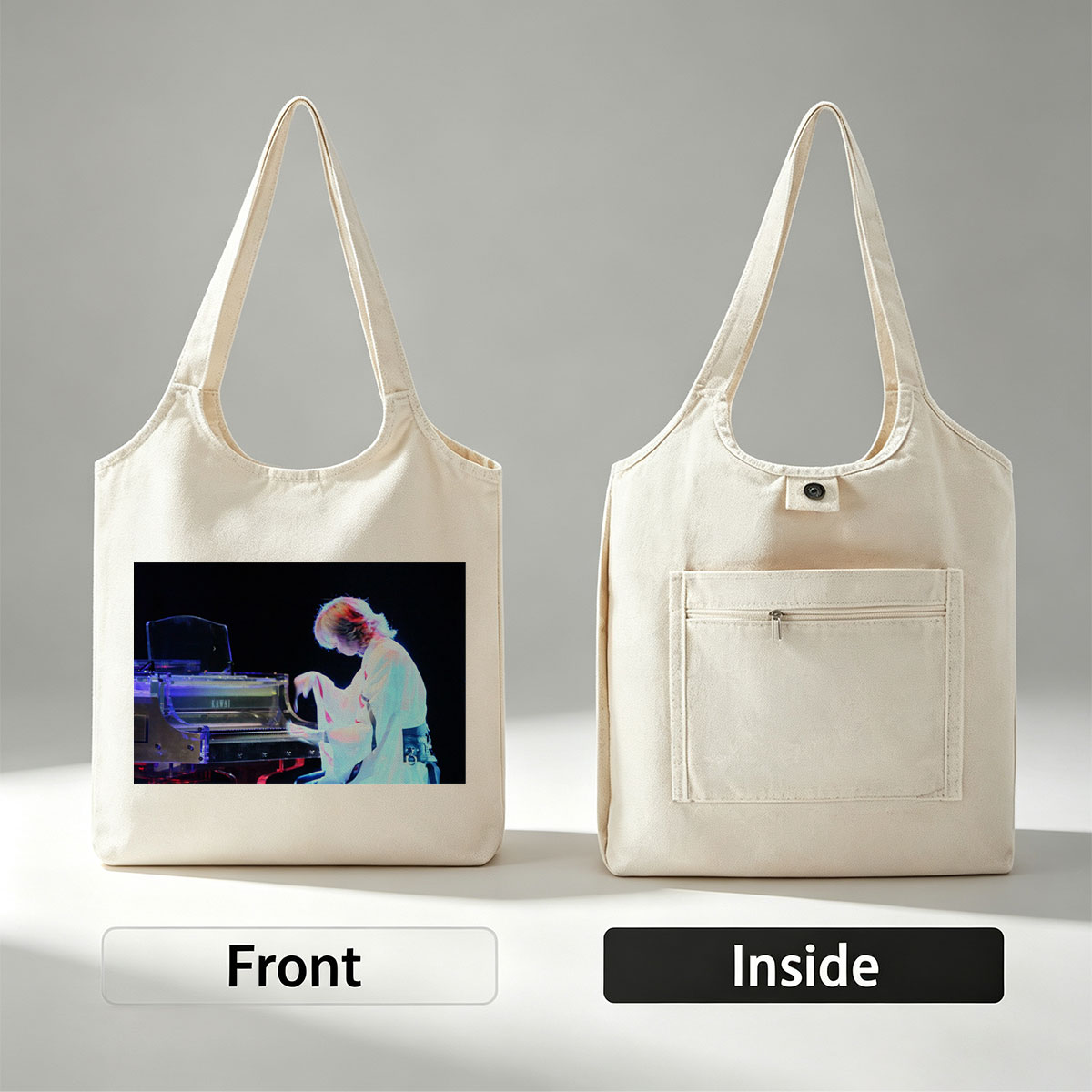 Yuki Kajiura Performing Piano on Stage with Dramatic Lighting - Canvas shoulder bags/