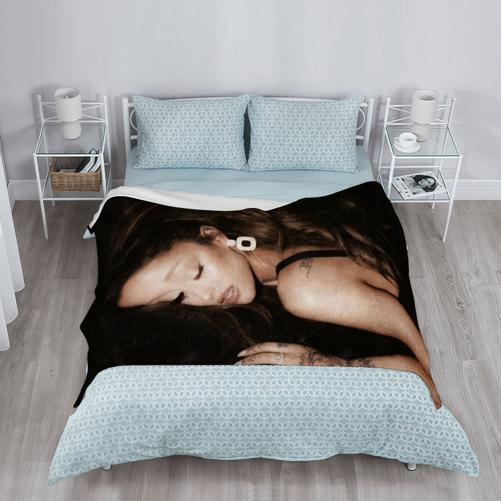 Ariana Grande in a Dramatic Pose with Long Hair and Tattoos on Dark Background - Blankets