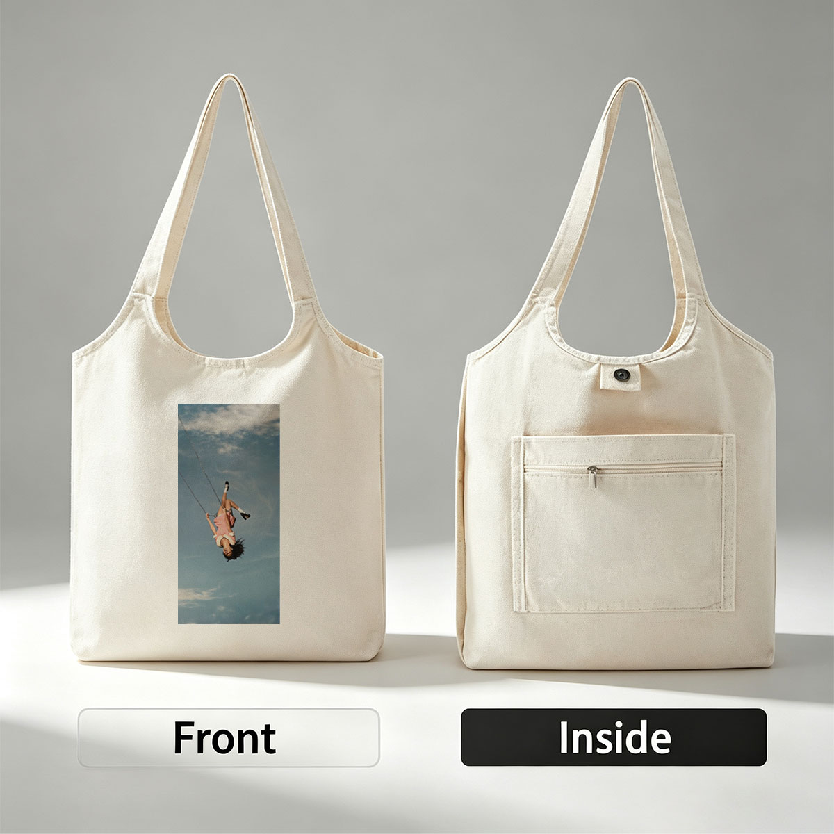 Taylor Swift Swinging on a Chain Against a Blue Sky - Canvas shoulder bags/