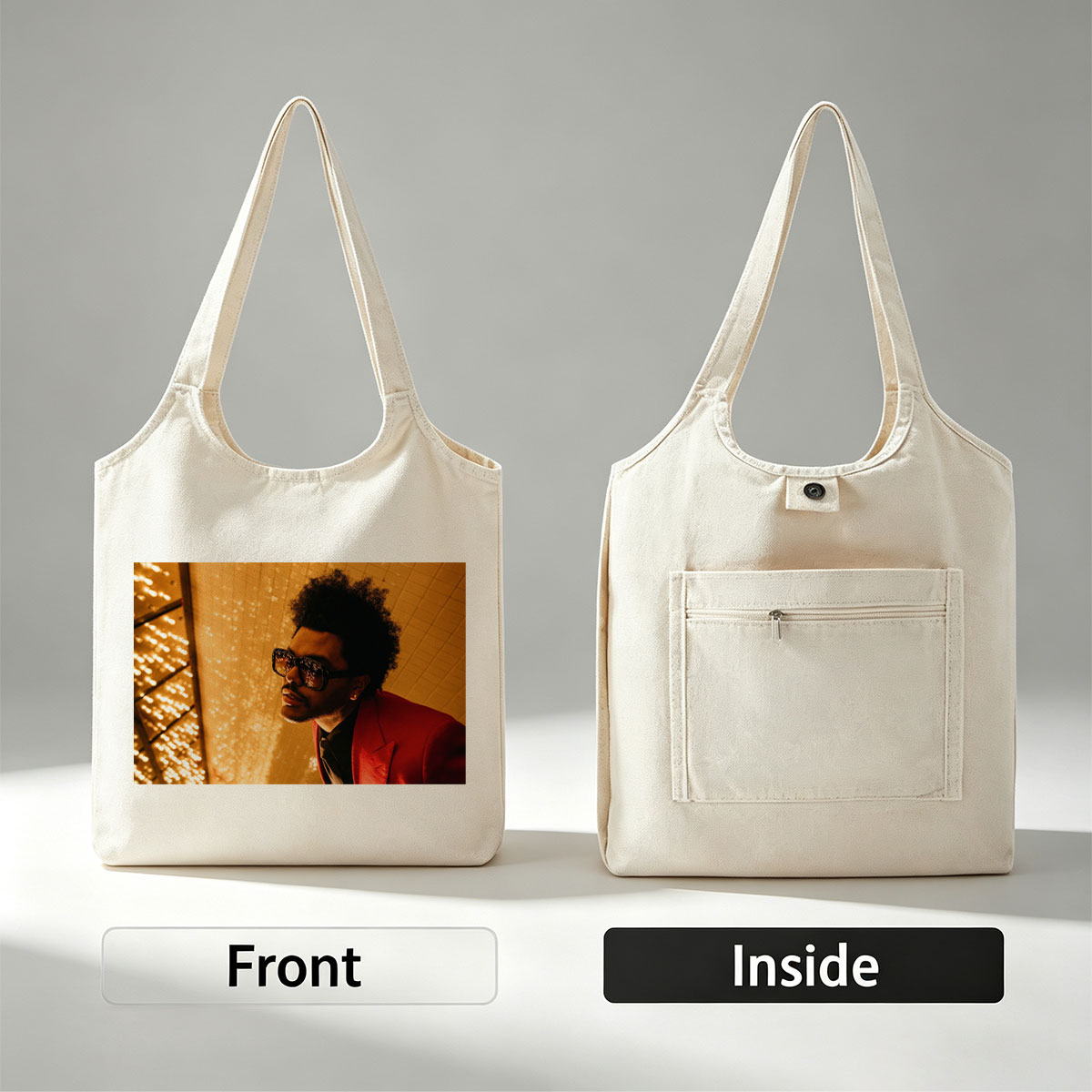 The Weeknd in a Red Suit and Sunglasses Against a Golden Lighted Background - Canvas shoulder bags/