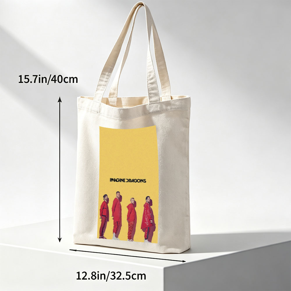Imagine Dragons Standing in Red Outfits Against a Yellow Background - Canvas tote bags