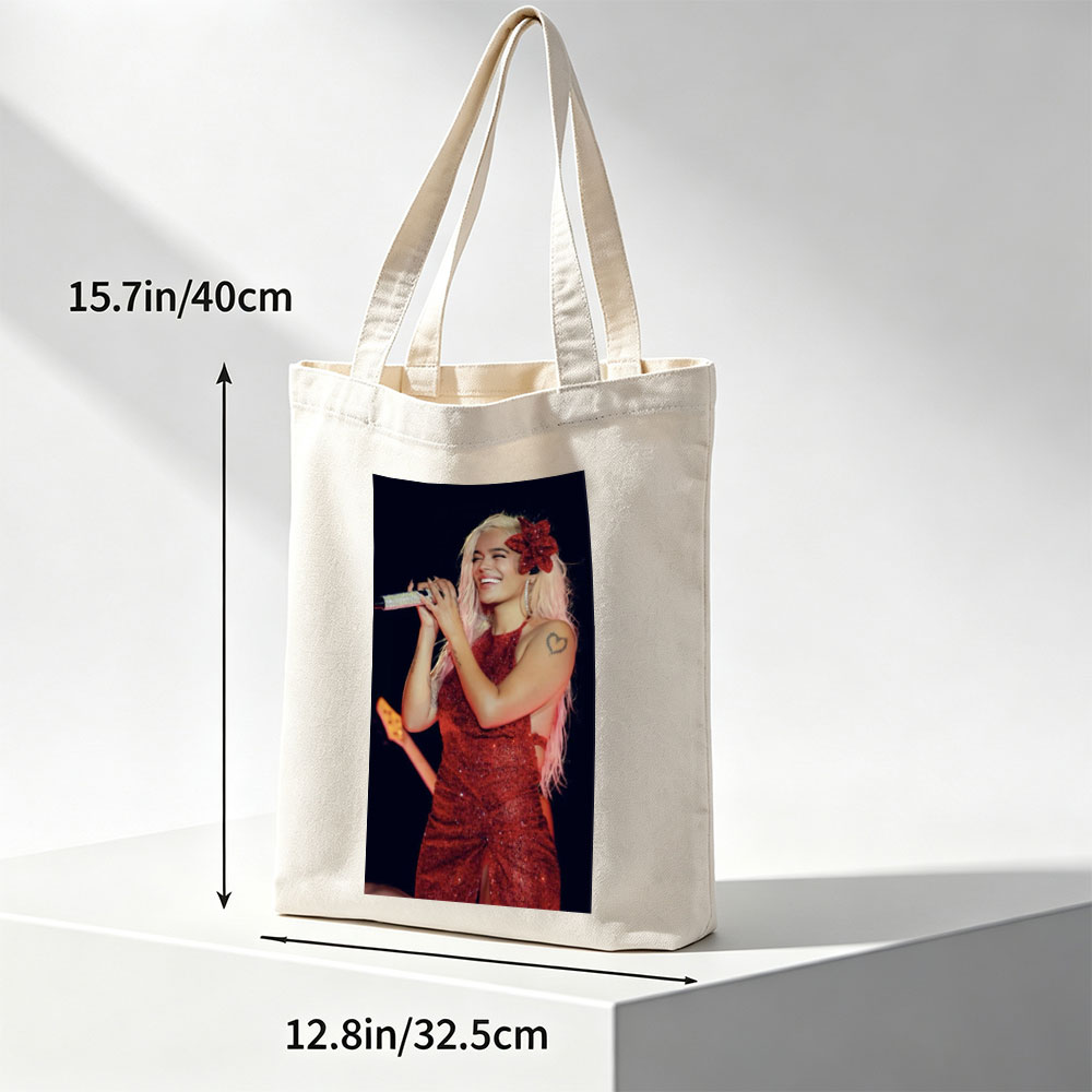 Bebe Rexha Performing on Stage in a Sparkling Red Dress with a Flower Hair Accessory - Canvas tote bags