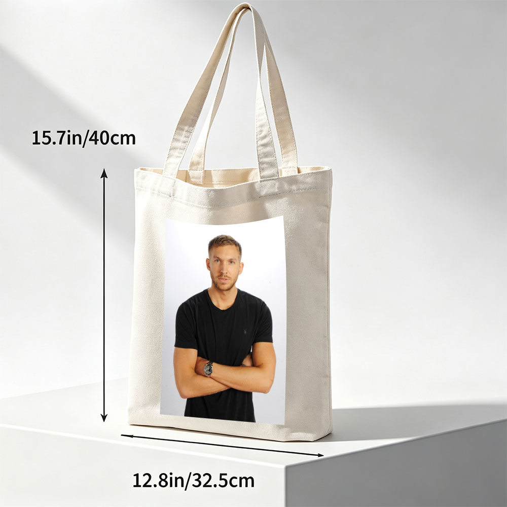 Calvin Harris Standing with Arms Crossed in Black T-Shirt Against White Background - Canvas tote bags