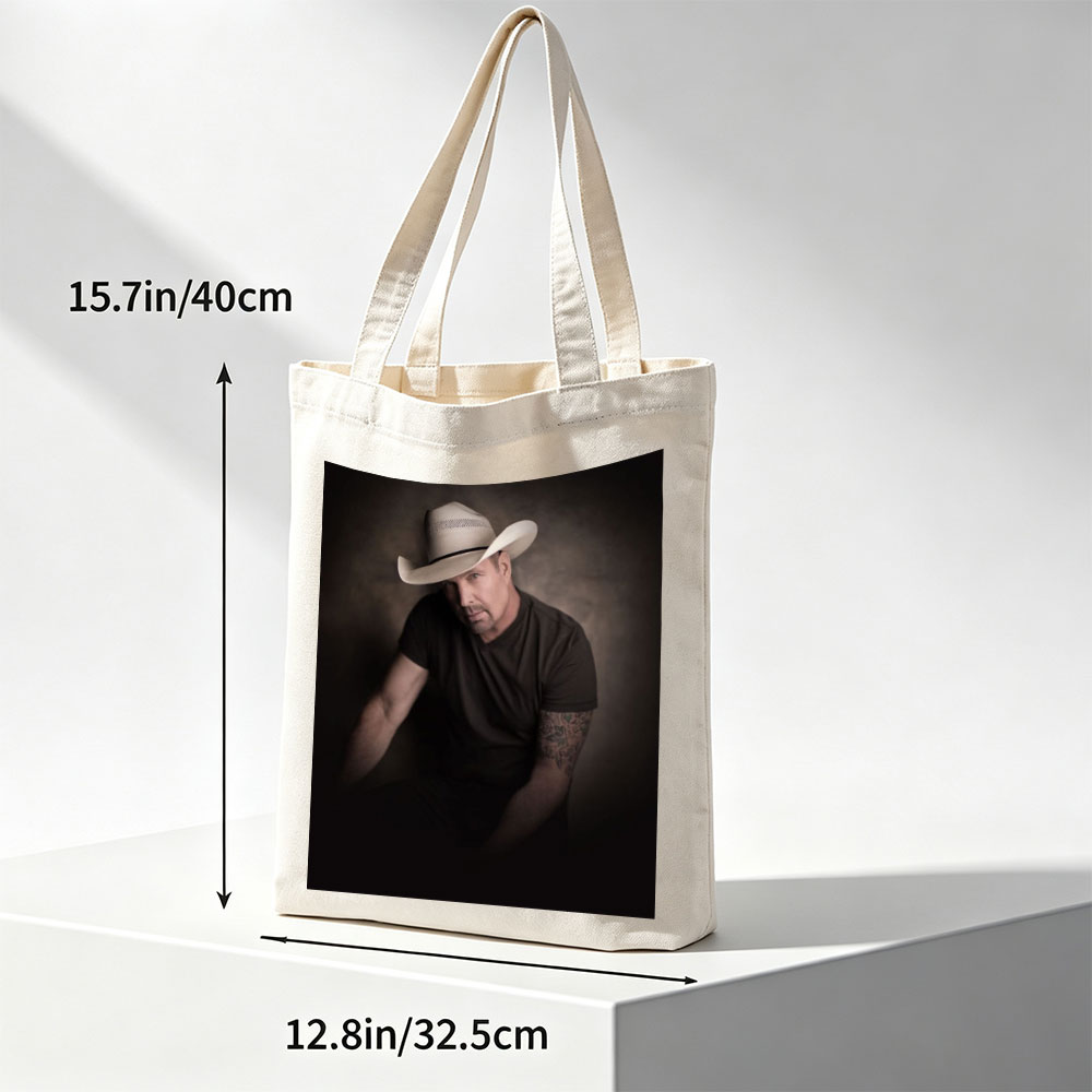 Tim McGraw in a Cowboy Hat - Intense Portrait with Tattooed Arm and Dark Background - Canvas tote bags