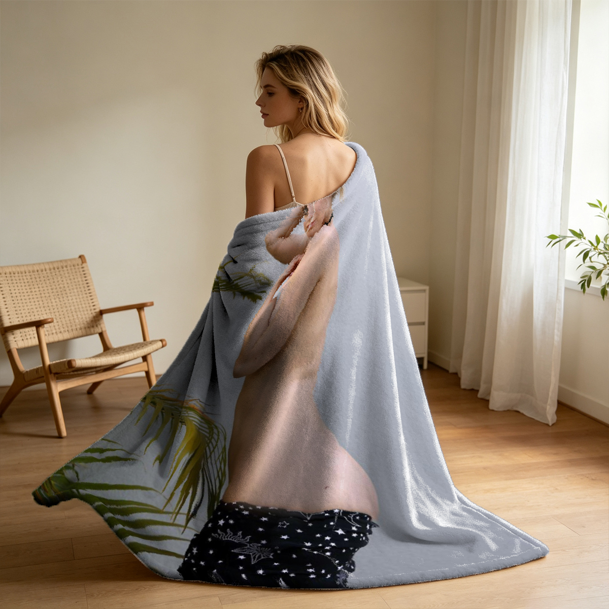 Nude woman lying on couch with legs raised, looking at camera. - Blanket