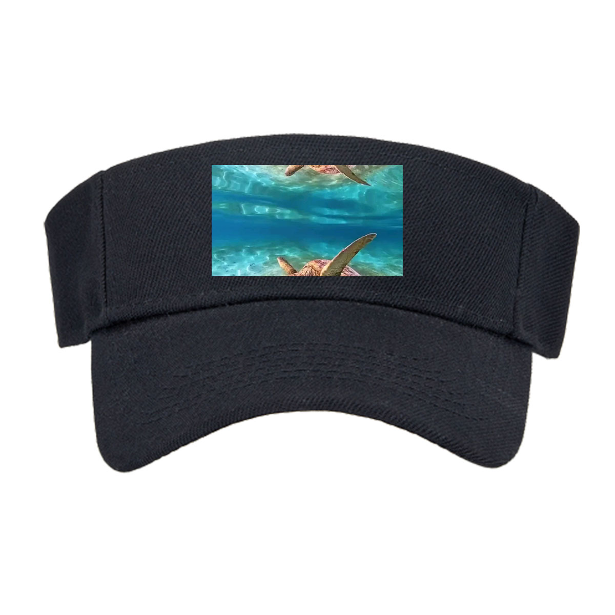 Sea turtles swim gracefully in clear blue waters, one near the surface and one gliding over sandy ocean floor. -  Visor cap