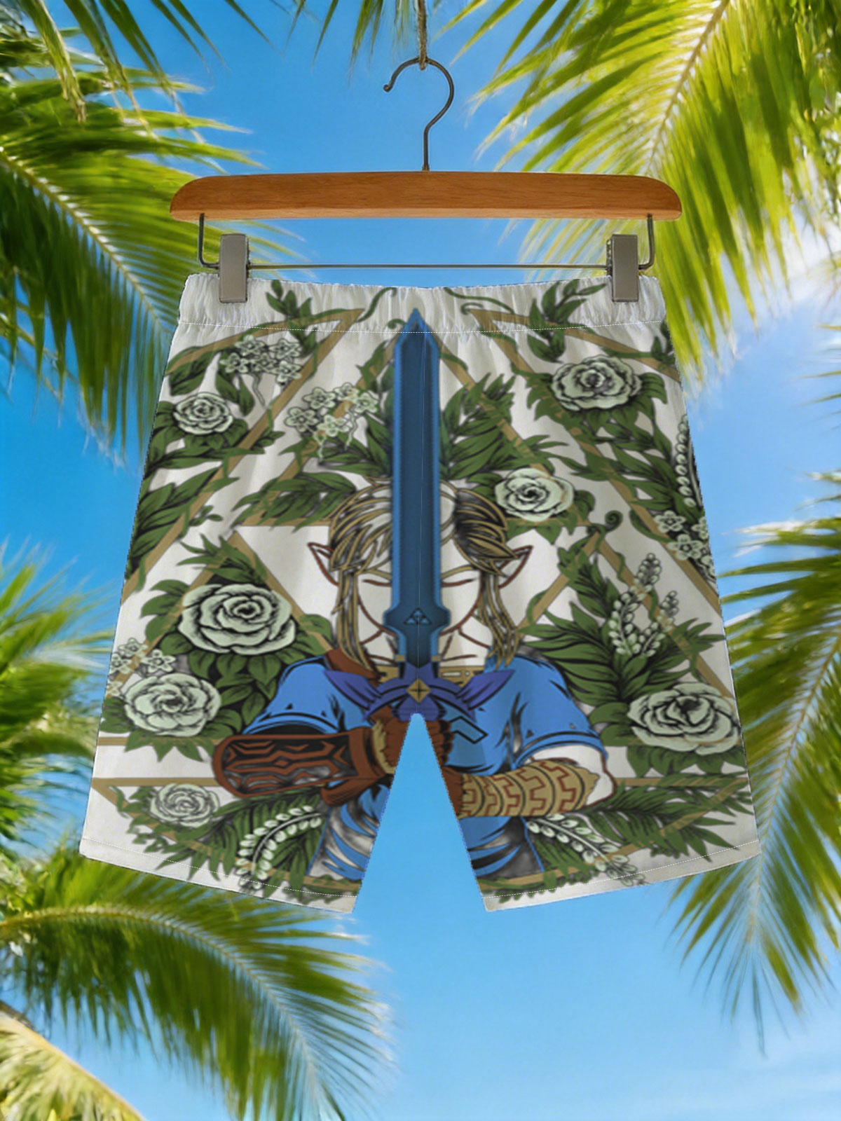 Link from The Legend of Zelda holding Master Sword, surrounded by floral wreath and geometric design -  Beach shorts