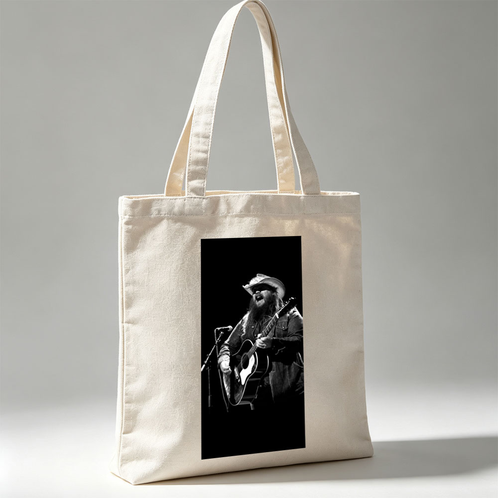 Chris Stapleton Performing on Stage with Acoustic Guitar in Black and White - Canvas tote bags