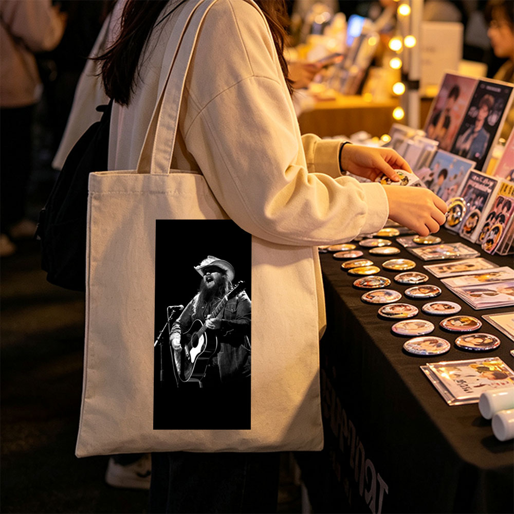 Chris Stapleton Performing on Stage with Acoustic Guitar in Black and White - Canvas tote bags