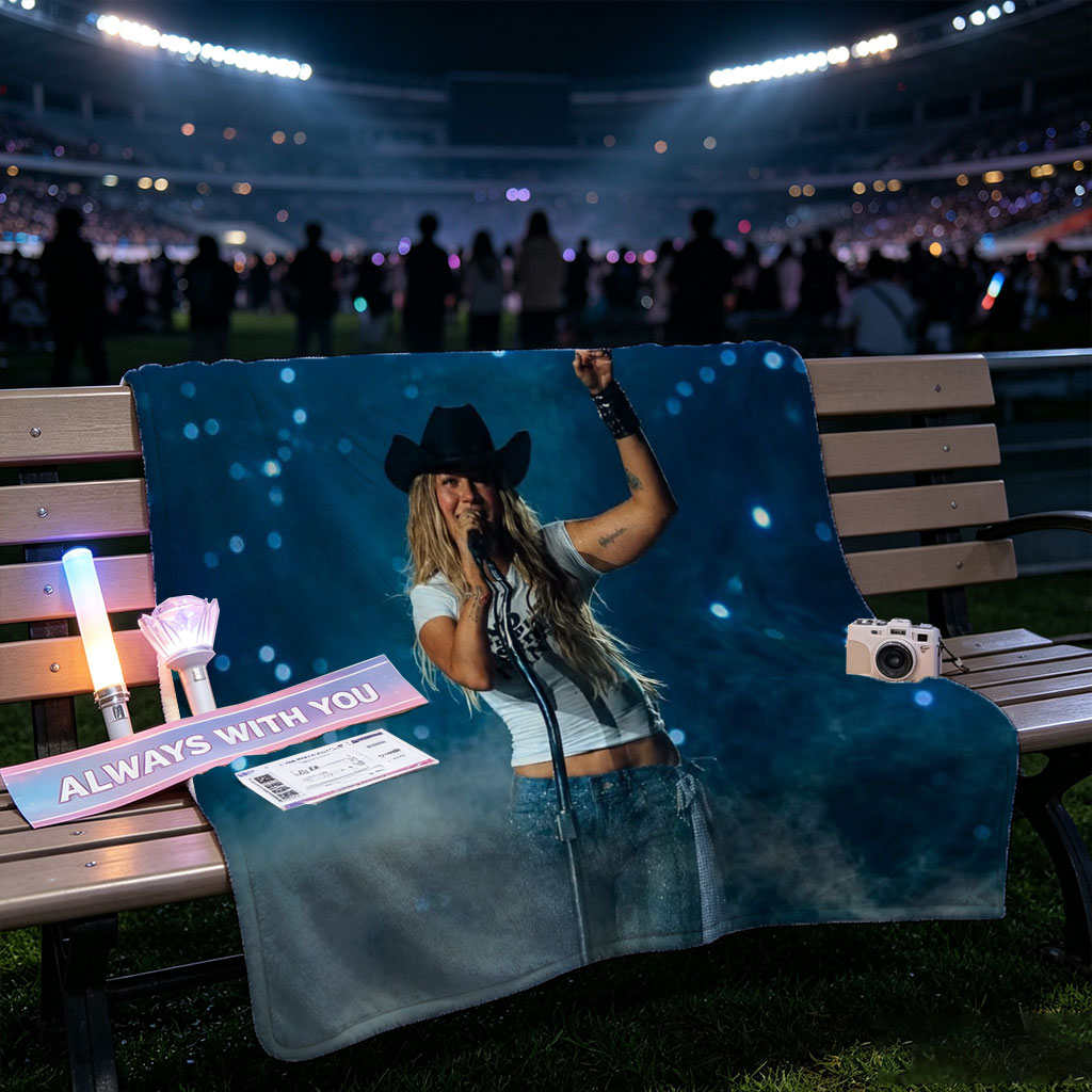Miranda Lambert on Stage Performing with a Microphone and Cowboy Hat Under Blue Lights - Blankets