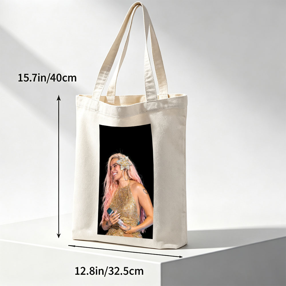 Demi Lovato on Stage in a Sparkling Gold Dress with Pink Hair and Flower Accessory - Canvas tote bags