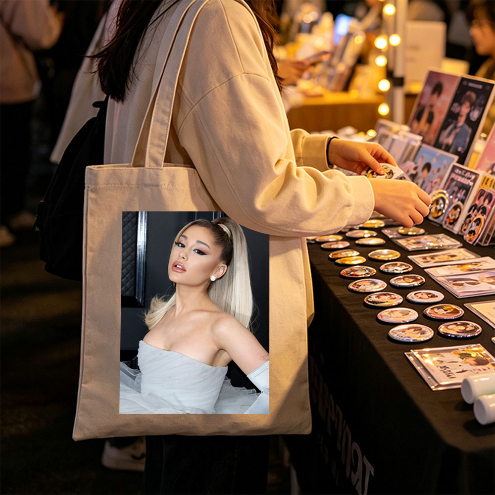 Ariana Grande at a Red Carpet Event Wearing a Light Blue Strapless Gown with Tulle Skirt and High Ponytail Hairstyle - Canvas tote bags