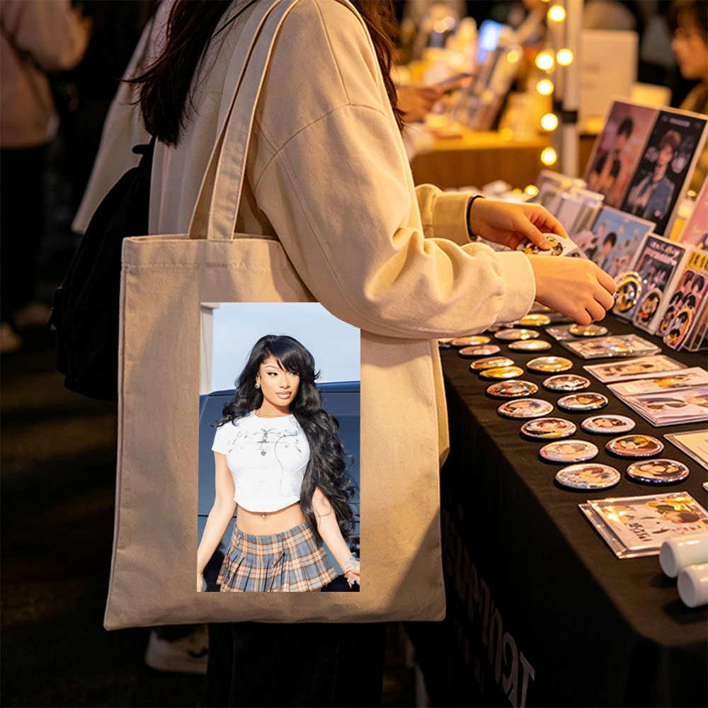 Cardi B in a Stylish Outfit with White Crop Top and Plaid Skirt Standing by a Car - Canvas tote bags