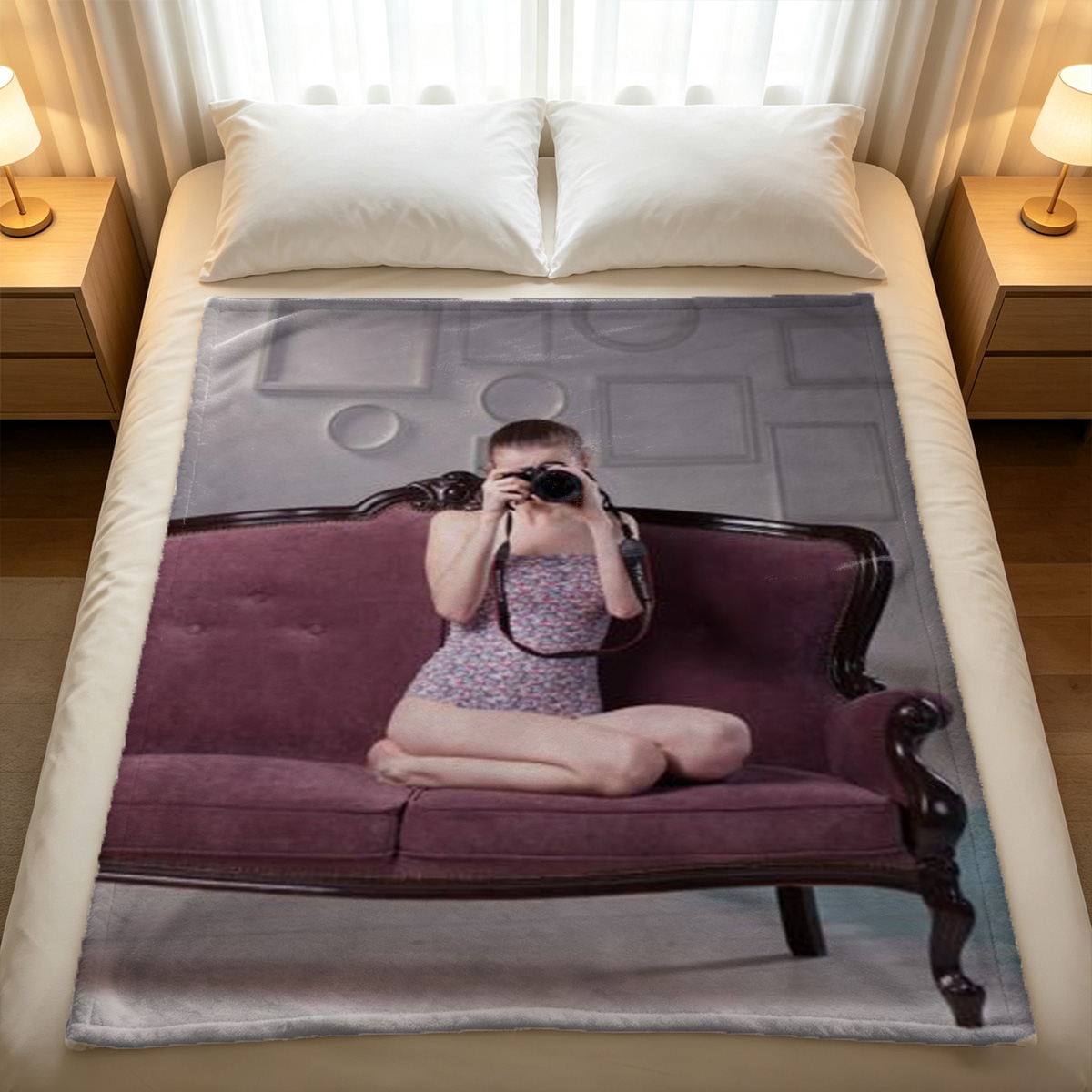 Nude woman with long curly hair posing in modern living room. - Blanket