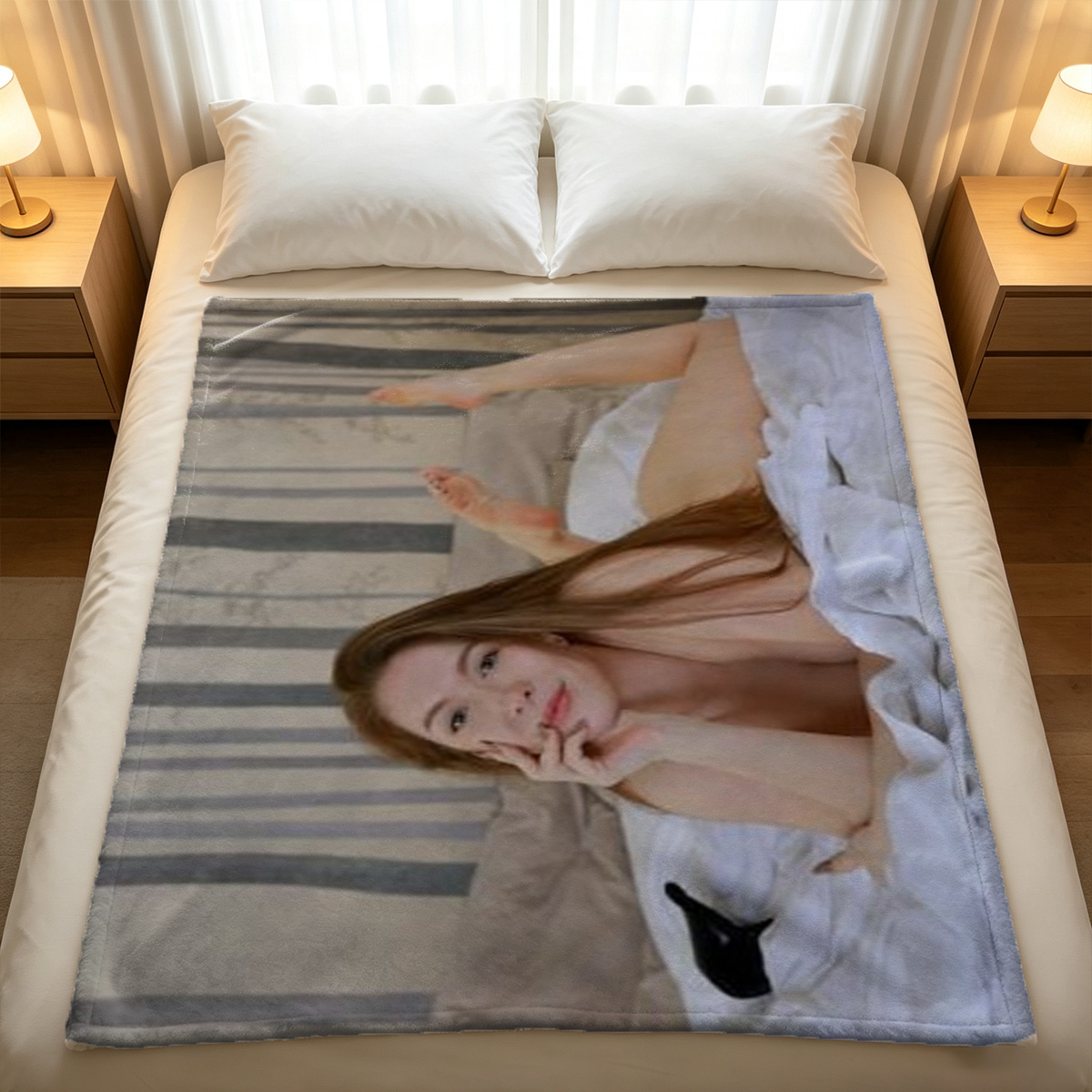 Nude curly-haired model posing on rug in front of sofa - Blanket