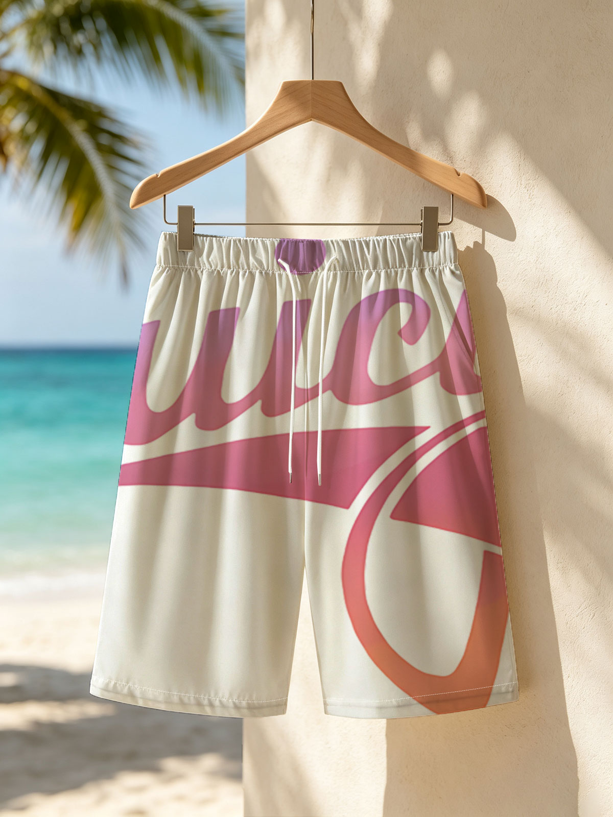 Juicy Couture Logo with Gradient Pink and Orange Design -  Beach shorts