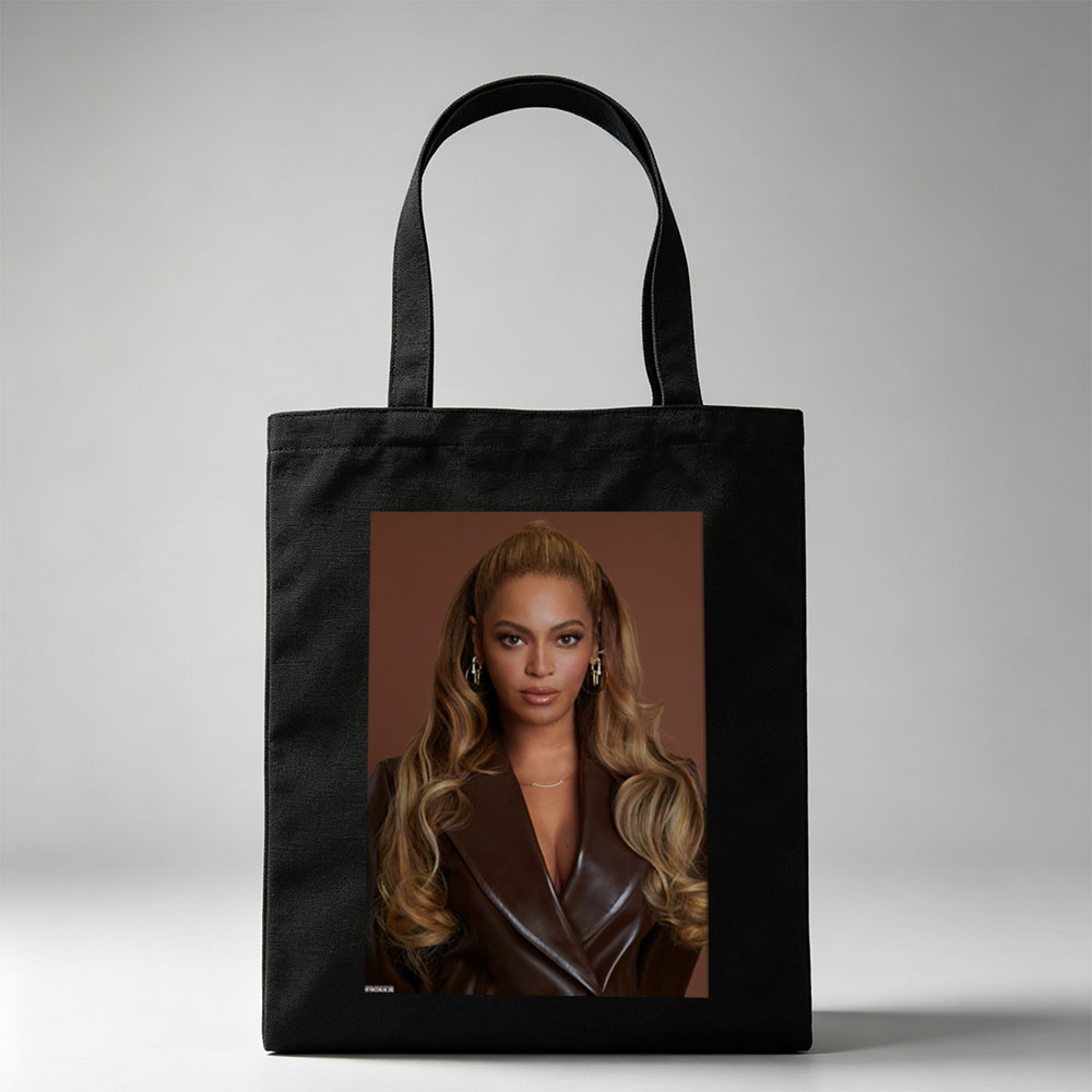 Beyonce in a Bold Brown Leather Look with Elegant Waves and Gold Jewelry - Canvas tote bags