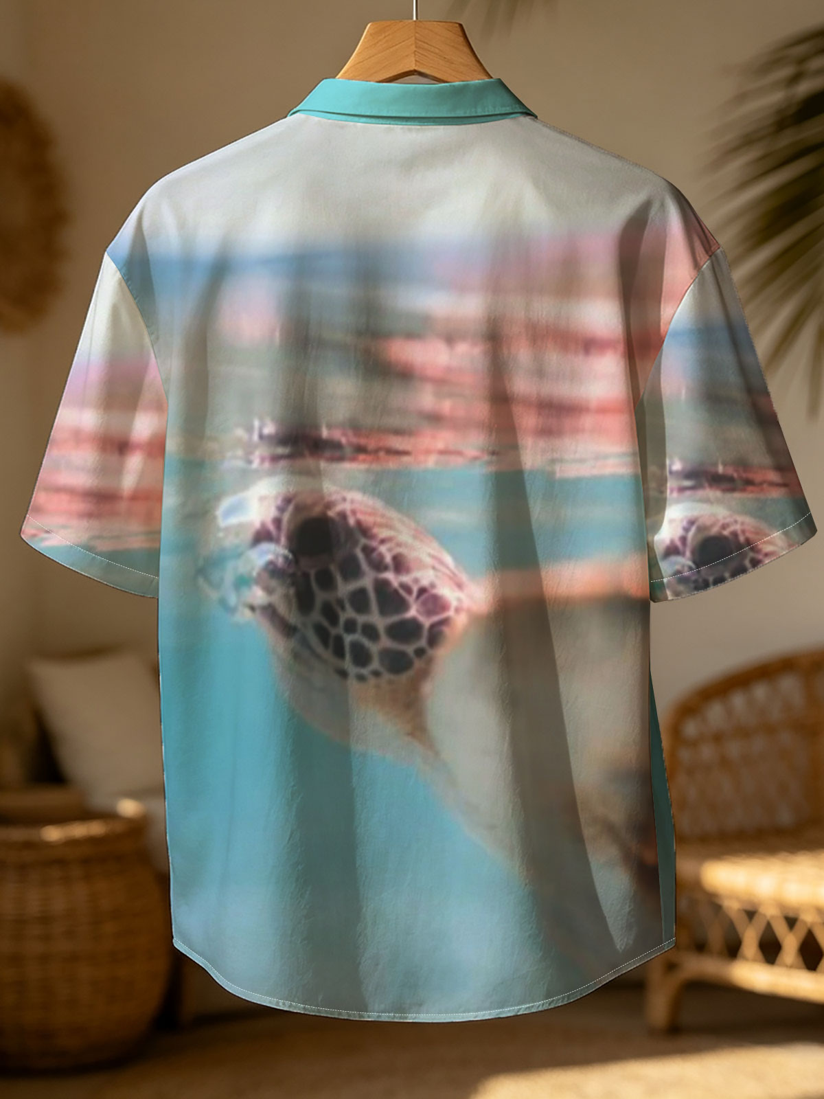 Sea turtle swimming at surface, half above water, clear blue ocean backdrop. -  Shirt