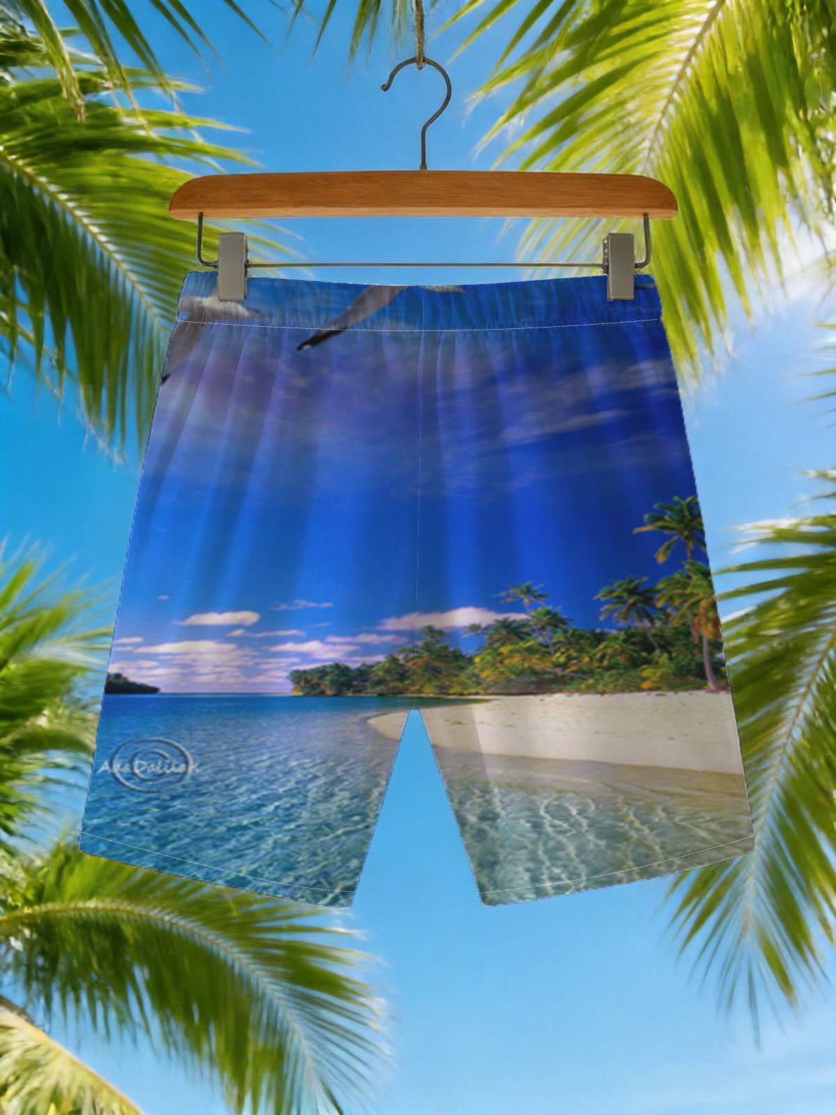 Seagulls soar over a pristine tropical beach with crystal-clear waters and palm trees under a vibrant blue sky. -  Beach shorts