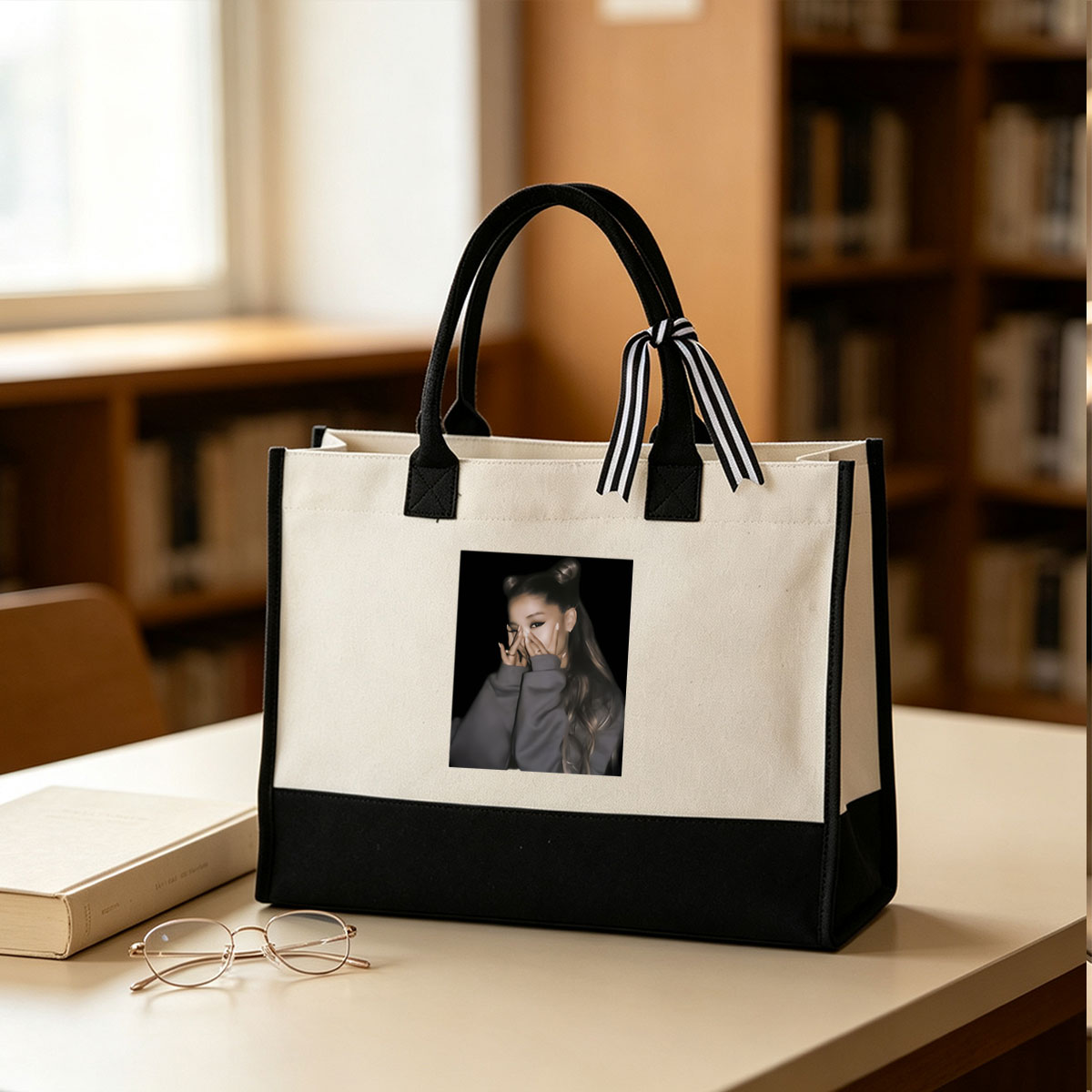 Ariana Grande with cat ears, covering face with hands, wearing gray hoodie - Canvas patchwork gift tote bag
