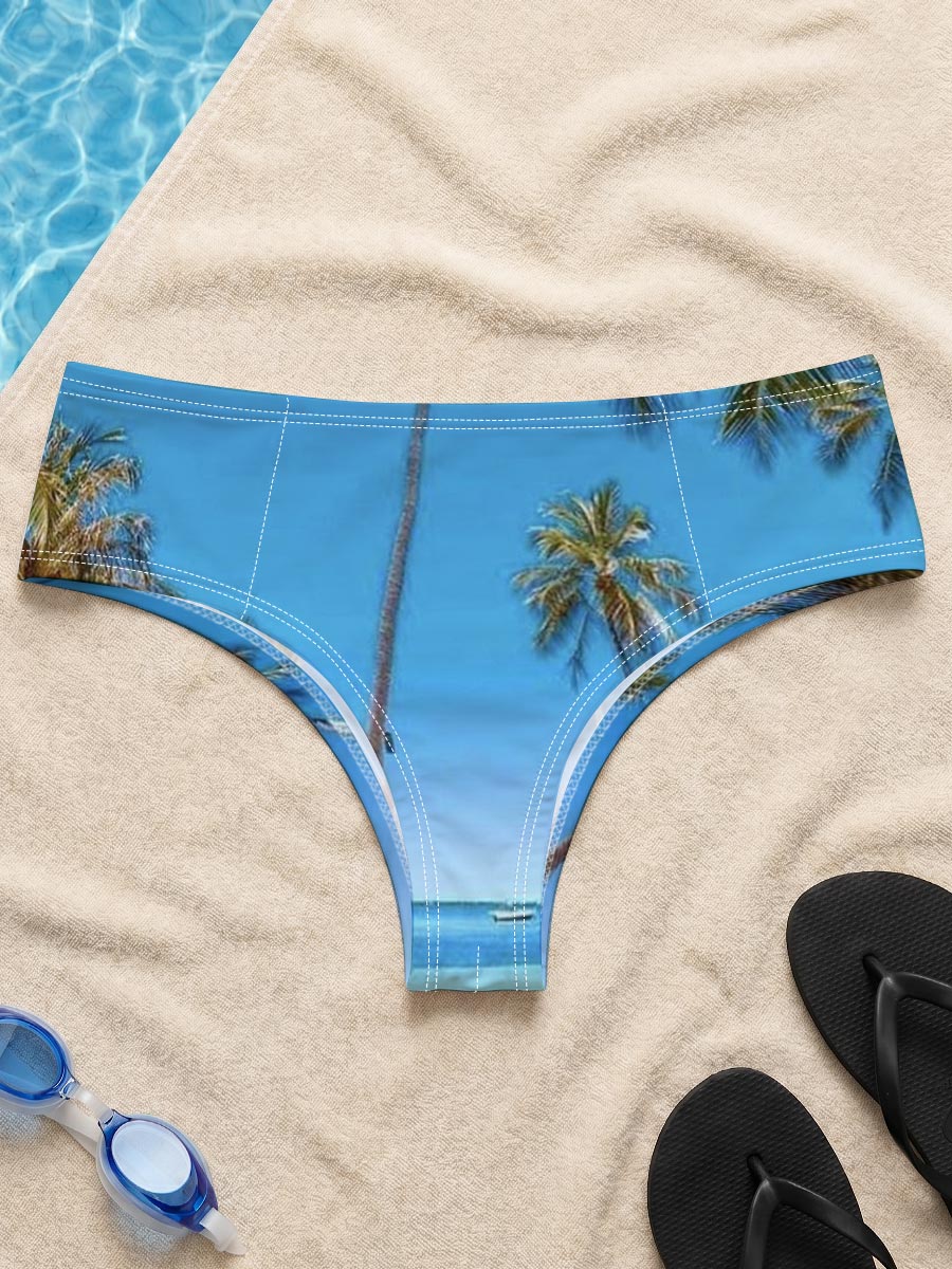 Tropical palm trees reflected in crystal-clear infinity pool under a vibrant blue sky. -  Men's swim trunks