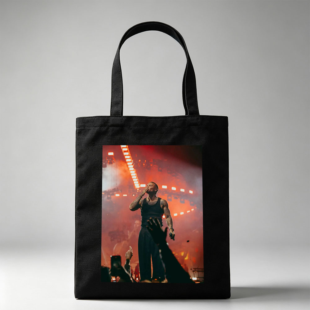 Tory Lanez on Stage Performing at a Concert with Intense Red Lighting and Crowd Engagement - Canvas tote bags