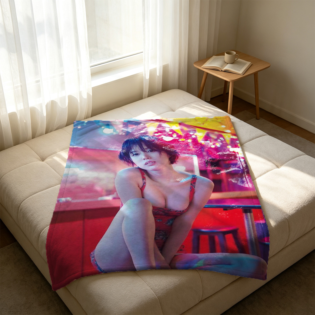 A woman with long black hair in a partially removed pink cardigan and grey lace bra, standing nude in a minimalist room. - Blanket