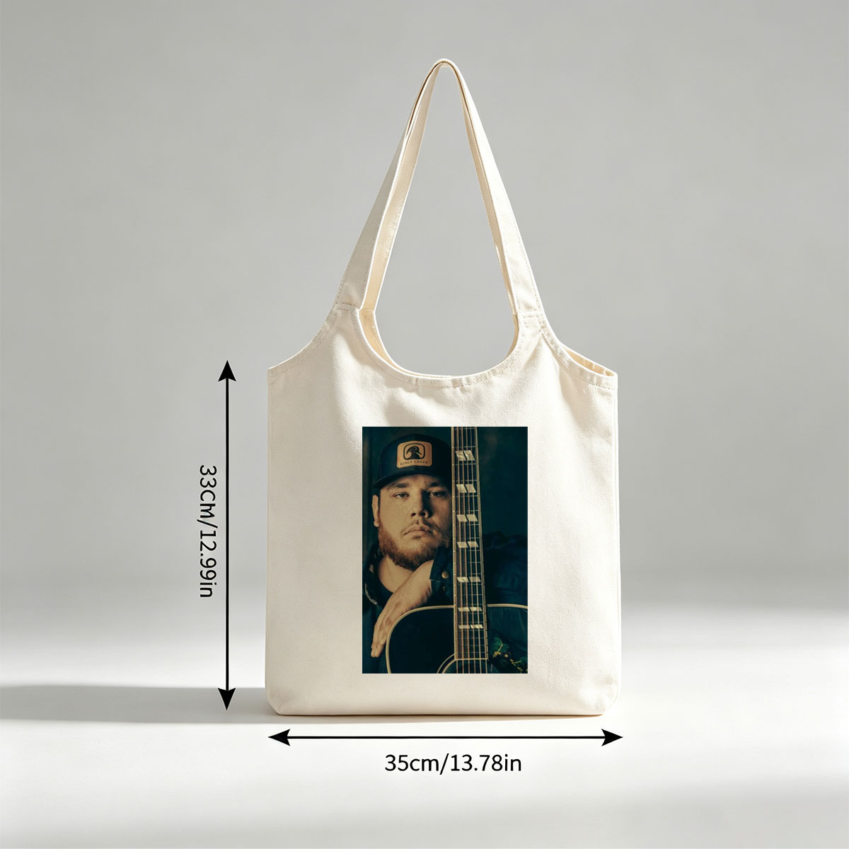 Luke Combs Holding Acoustic Guitar in Studio Portrait - Canvas shoulder bags/