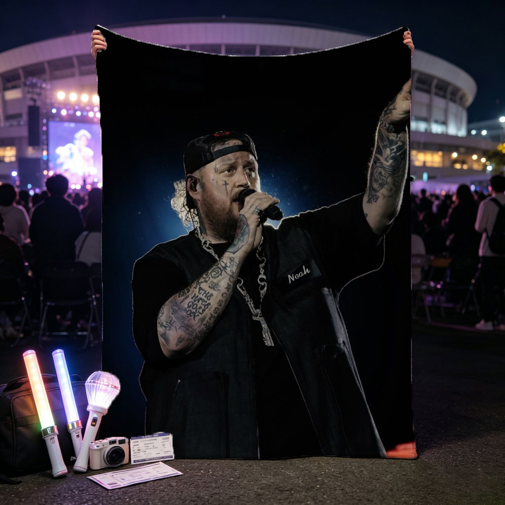 Jelly Roll Performing on Stage with Microphone and Tattooed Arms - Blankets